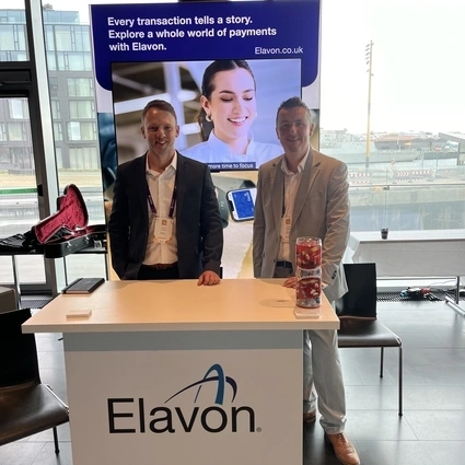 Dave Slatter with Jamie Elliott at the Elavon stand at conneXion 2024