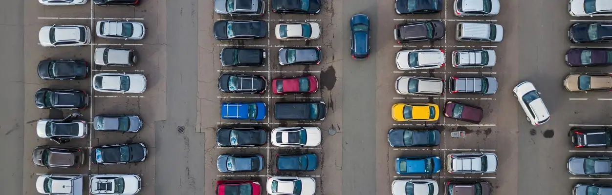 Birdeye view of cars on a parking lot